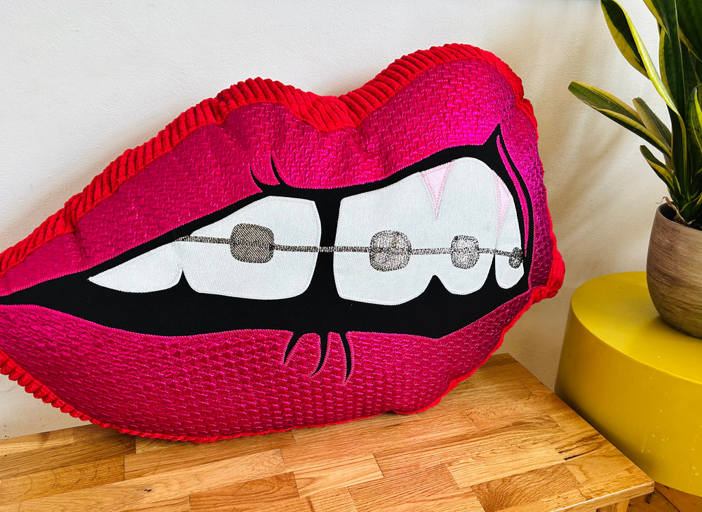 One Off Supersized Bite Back Cushion - Pink and Red with braces
